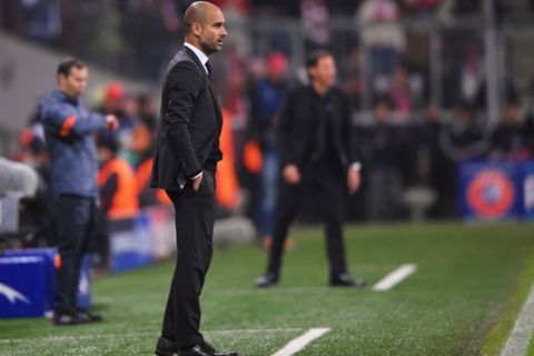MUNICH, GERMANY - NOVEMBER 05:  Josep Guardiola manager of Bayern Muenchen looks on during the UEFA Champions League Group E match between FC Bayern Munchen and AS Roma at Allianz Arena on November 5, 2014 in Munich, Germany.  (Photo by Adam Pretty/Bongarts/Getty Images) 458462038