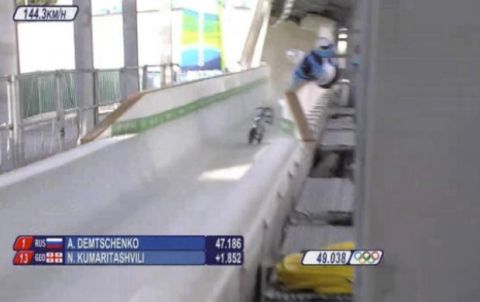 In this frame grab taken from video provided by the IOC Media Broadcast, Georgian luge athlete Nodar Kumaritashvili loses control of sled and crashes during a high-speed training run at the Olympic Sliding Center in Whistler, British Columbia, Friday Feb. 12, 2010. Kumaritashvili later died at a hospital and IOC president Jacques Rogge said the death hours before the opening ceremony "clearly casts a shadow over these games." (AP Photo/IOC Media Broadcast)