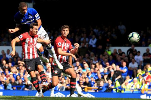Everton's Richarlison, top left, scores his side's second goal of the game against Southampton during their English Premier League soccer match at Goodison Park in Liverpool, Saturday Aug. 18, 2018. (Peter Byrne/PA via AP)