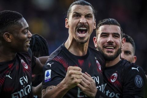 Milan's Zlatan Ibrahimovic celebrates with teammates after scoring his side's second goal during an Italian Serie A soccer match between Cagliari and Milan in Cagliari, Saturday, Jan. 11, 2020. (Spada(/LaPresse via AP)