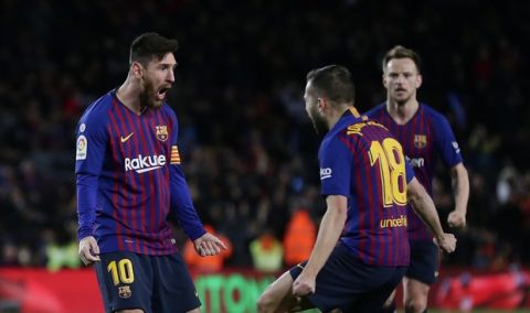 FC Barcelona's Lionel Messi celebrates after scoring during the Spanish La Liga soccer match between FC Barcelona and Valencia at the Camp Nou stadium in Barcelona, Spain, Saturday, Feb. 2, 2019. (AP Photo/Manu Fernandez)