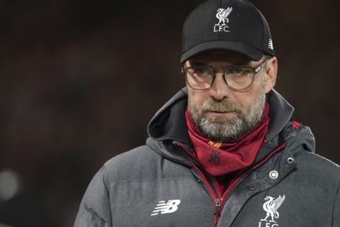 Liverpool's manager Jurgen Klopp waits for the start of the English Premier League soccer match between Liverpool and Sheffield United at Anfield Stadium, Liverpool, England, Thursday, Jan. 2, 2020. (AP Photo/Jon Super)