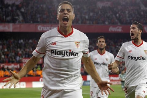Sevilla's Ben Yedder, celebrates after scoring against Real Madrid during La Liga soccer match between Sevilla and Real Madrid at the Sanchez Pizjuan stadium, in Seville, Spain on Wednesday, May. 9, 2018. (AP Photo/Miguel Morenatti)