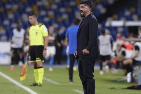 Napoli coach Gennaro Gattuso shouts during the Italian Cup second leg semifinal soccer match between Napoli and Inter Milan, at the Naples San Paolo Stadium, Italy, Saturday, June 13, 2020. The match is being played without spectators because of the COVID-19 restriction measures. (Cafaro/LaPresse via AP)