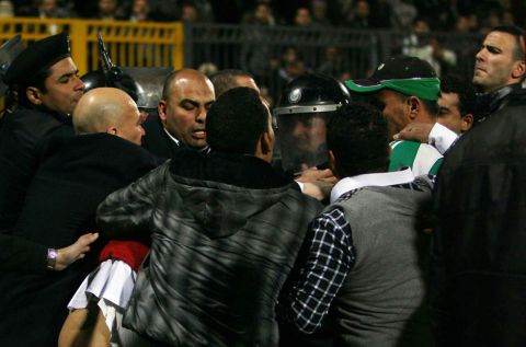 Egyptian police clash with fans after a football match between Al-Ahly and Al-Masry teams in Port Said, 220 kms northeast of Cairo, on February 1, 2012. At least 73 people were killed and hundreds injured according to medical sources. AFP PHOTO/STR (Photo credit should read -/AFP/Getty Images)