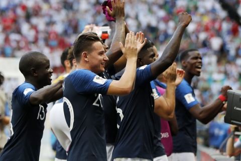 France national soccer team players celebrate after winning the round of 16 match between France and Argentina, at the 2018 soccer World Cup at the Kazan Arena in Kazan, Russia, Saturday, June 30, 2018. (AP Photo/Frank Augstein)