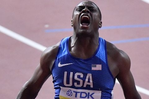 Christian Coleman, of the United States, reacts after winning the men's 100 meter race during the World Athletics Championships in Doha, Qatar, Saturday, Sept. 28, 2019. (AP Photo/Martin Meissner)