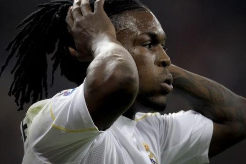 Real Madrid's Royston Drenthe of the Netherlands reacts during a Spanish La Liga soccer match  against Racing Santander at the Santiago  Bernabeu stadium in Madrid Saturday Nov. 21, 2009. (AP Photo/Paul White)