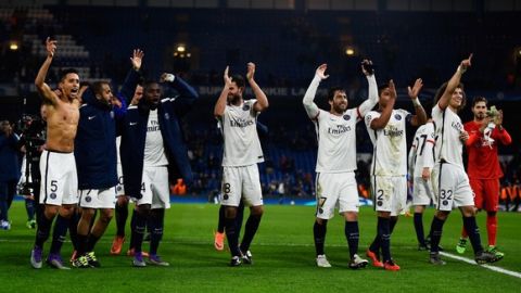 "LONDON, ENGLAND - MARCH 09:  PSG players celebrate following their team's 2-1 victory during the UEFA Champions League round of 16, second leg match between Chelsea and Paris Saint Germain at Stamford Bridge on March 9, 2016 in London, United Kingdom.  (Photo by Mike Hewitt/Getty Images)"