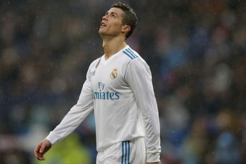 Real Madrid's Cristiano Ronaldo reacts during a Spanish La Liga soccer match between Real Madrid and Villarreal at the Santiago Bernabeu stadium in Madrid, Spain, Saturday, Jan. 13, 2018. (AP Photo/Paul White)