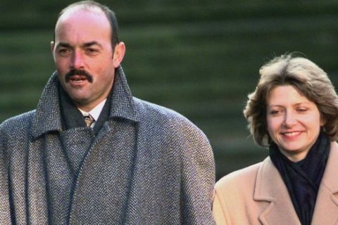 Former Liverpool and Southampton soccer star Bruce Grobbelaar leaves Winchester Court, with his wife, Tuesday, Jan. 14,1997, for a lunch break during the first days trial for alleged match fixing in England soccers biggest bribery scandal in 32 years. Grobbelaar is on trial along with two former Premier League soccer players Hans Segers and John Fashanu and Malaysain businessman Heng Suen Lim, accused of conspiracy to rig soccer matches. (AP Photo/Dave Caulkin)