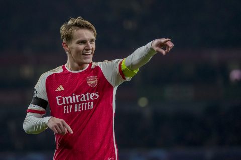 Arsenal's Martin Odegaard celebrates after scoring his side's fifth goal during the Champions League Group B soccer match between Arsenal and Lens, at Emirates stadium, in London, Wednesday, Nov. 29, 2023. (AP Photo/Kin Cheung)