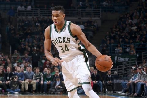 Milwaukee, WI - JANUARY 28:  Giannis Antetokounmpo #34 of the Milwaukee Bucks handles the ball against the Boston Celtics on January 28, 2017 at the BMO Harris Bradley Center in Milwaukee, Wisconsin. NOTE TO USER: User expressly acknowledges and agrees that, by downloading and or using this Photograph, user is consenting to the terms and conditions of the Getty Images License Agreement. Mandatory Copyright Notice: Copyright 2017 NBAE (Photo by Gary Dineen/NBAE via Getty Images)