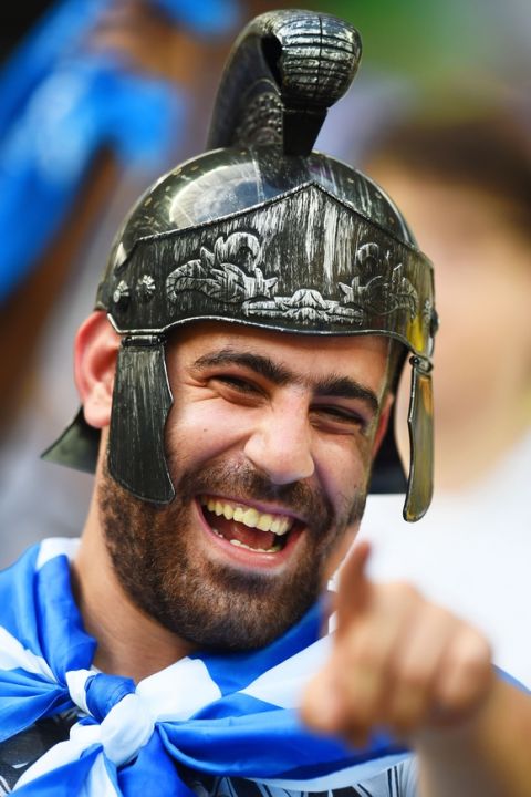 FORTALEZA, BRAZIL - JUNE 24:  A Greece fan enjoys the atmosphere prior to kickoff during the 2014 FIFA World Cup Brazil Group C match between Greece and the Ivory Coast at Castelao on June 24, 2014 in Fortaleza, Brazil.  (Photo by Jamie McDonald/Getty Images)