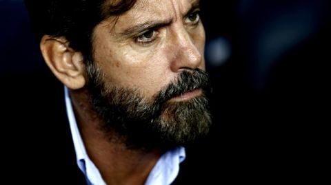 Espanyol's coach Quique Sanches Flores looks on prior to the Spanish Copa del Rey, quarter final, second leg, soccer match between FC Barcelona and Espanyol at the Camp Nou stadium in Barcelona, Spain, Thursday, Jan. 25, 2018. (AP Photo/Manu Fernandez)
