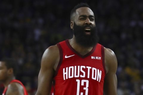 Houston Rockets' James Harden reacts during the second half of the team's NBA basketball game against the Golden State Warriors Thursday, Jan. 3, 2019, in Oakland, Calif. (AP Photo/Ben Margot)