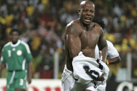 Ghana's Junior Agogo celebrates after scoring against  Nigeria during their African Cup of Nations quarter-final soccer match in Accra, Ghana, Sunday Feb. 3, 2008. Ghana won the match 2-1. (AP Photo/Alastair Grant)