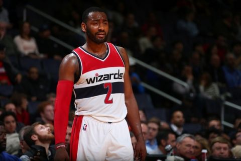 WASHINGTON, DC - DECEMBER 6:  John Wall #2 of the Washington Wizards looks on during a game against the Orlando Magic on December 6, 2016 at the Verizon Center in Washington, DC. NOTE TO USER: User expressly acknowledges and agrees that, by downloading and/or using this photograph, user is consenting to the terms and conditions of the Getty Images License Agreement. Mandatory Copyright Notice: Copyright 2016 NBAE (Photo by Ned Dishman/NBAE via Getty Images)