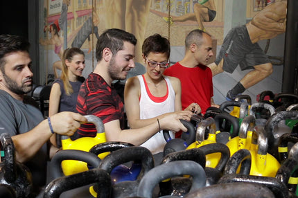 Κάτσε κάτω από το kettlebell