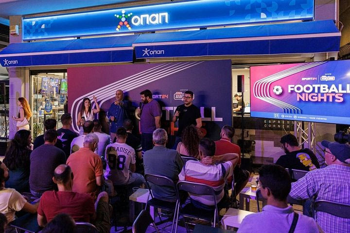 Αυλαία στους ομίλους του Ευρωπαϊκού με γκολ, ένταση και εκπλήξεις σε κατάστημα ΟΠΑΠ στο Αιγάλεω – Η απόλυτη ποδοσφαιρική βραδιά παρέα με τους Θωμά Ζάμπρα και Λάμπρο Κωνσταντάρα