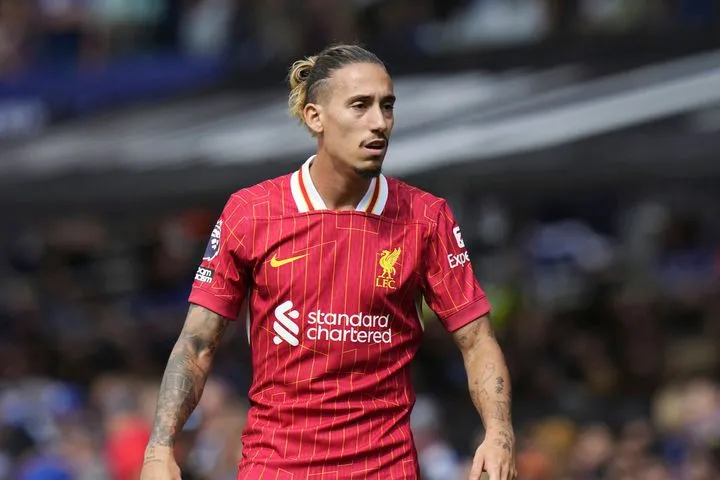 O Κώστας Τσιμίκας με τη φανέλα της Λίβερπουλ